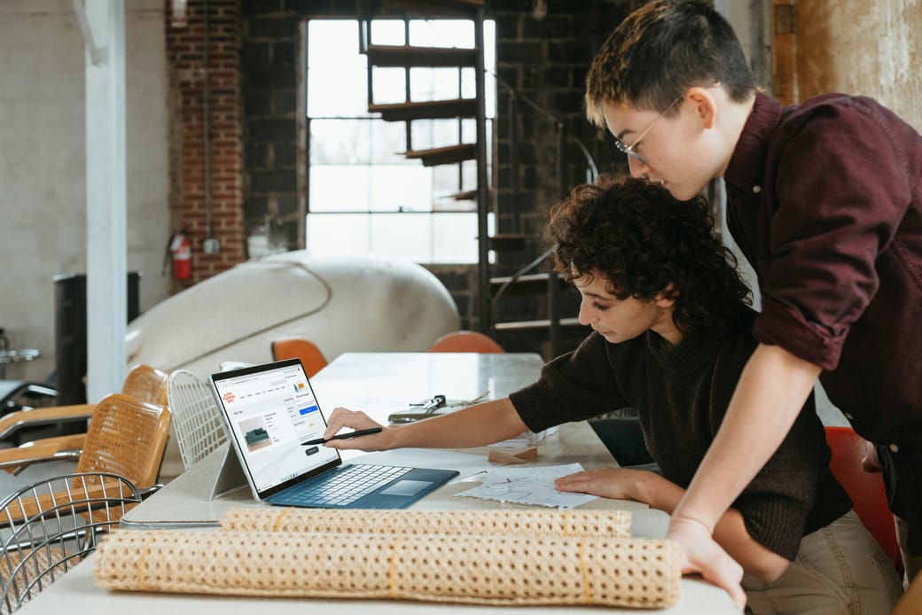 Modern collaborative office with structured workspaces — representing organized, functional business operations