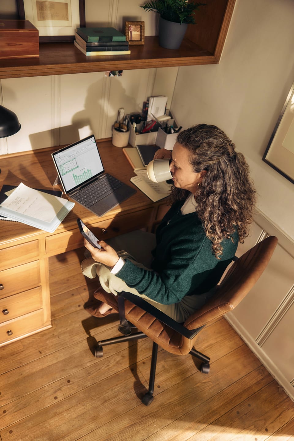 Business owner managing operations from a home office